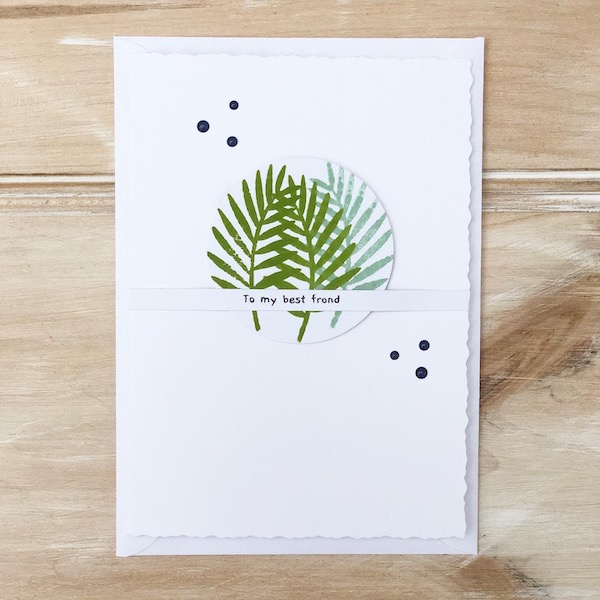 Simple handmade card featuring stamped green ferns on a die cut circle with the sentiment 'to my best frond'