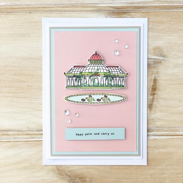 Pink and blue handmade card with colourful pastel palm house and lily pond