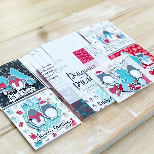 Penguins and Presents Christmas Card Kit - spread of handmade penguins cards, paper pack and cute penguins ephemera