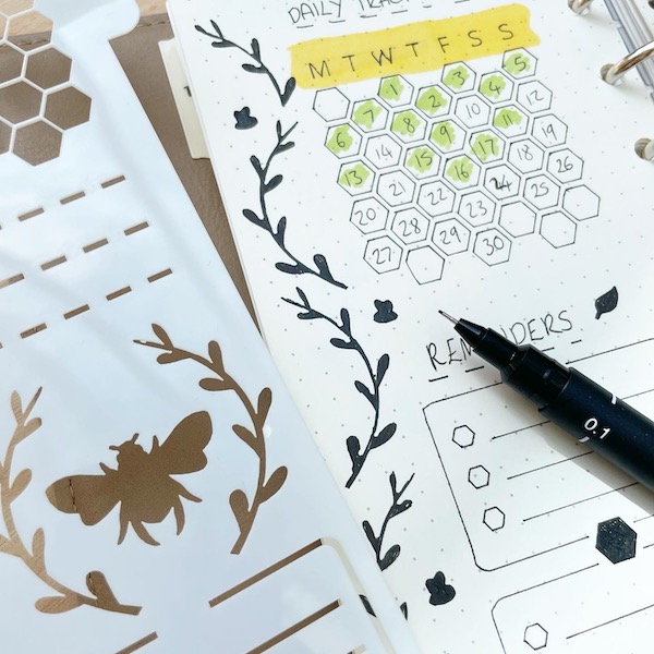 Bee planner stencil and stencilled bees and leaves
